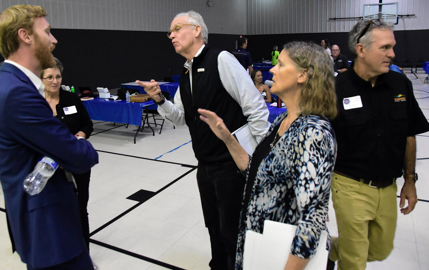 JAY NIXON, former governor of Missouri (center), visits Friday afternoon after speaking at the Rock Island Summit in Eldon with State Rep. Peter Merideth, D-St. Louis, and Owensville resident and Friends of the Rock Island Trail member Chrysa Niewald.